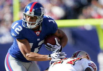 EAST RUTHERFORD, NJ - OCTOBER 19:  Steve Smith of the New York Giants is tackled by Walt Harris #27 of the San Francisco 49ers on October 19, 2008 at Giant Stadium in East Rutherford, New Jersey.  (Photo by Chris Trotman/Getty Images)