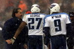 17 Dec 2000:  Head coach Jeff Fisher of the Tennessee Titans congratulates Quarterback Steve McNair #9  and Eddie George #27 after a touchdown during Sunday's game against the Cleveland Browns at Cleveland Browns Stadium in Cleveland, Ohio.  Digital Image. Mandatory Credit: Jamie Squire/ALLSPORT