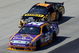 DOVER, DE - MAY 31: Jamie McMurray, driver of the #26 Crown Royal Ford leads Elliott Sadler, driver of the #19 Stanley Tools Dodge during the NASCAR Sprint Cup Series Autism Speaks 400 at Dover International Speedway on May 31, 2009 in Dover, Delaware. (Photo by Nick Laham/Getty Images)