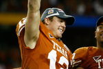 GLENDALE, AZ - JANUARY 05:  Quarterback Colt McCoy #12 of the Texas Longhorns celebrates after defeating the Ohio State Buckeyes in the Tostitos Fiesta Bowl Game on January 5, 2009 at University of Phoenix Stadium in Glendale, Arizona. The Longhorns defeated the Buckeyes 24-21  (Photo by Jeff Gross/Getty Images)