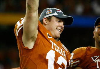 GLENDALE, AZ - JANUARY 05:  Quarterback Colt McCoy #12 of the Texas Longhorns celebrates after defeating the Ohio State Buckeyes in the Tostitos Fiesta Bowl Game on January 5, 2009 at University of Phoenix Stadium in Glendale, Arizona. The Longhorns defeated the Buckeyes 24-21  (Photo by Jeff Gross/Getty Images)