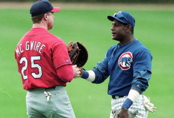 20 Sep 1999:  Sammy Sosa #21 of the Chicago Cubs shakes hands with Mark McGwire #25 of the St. Louis Cardinals at Wrigley Field in Chicago, Illinois. The Cardinals defeated the Cubs 7-2. Mandatory Credit: Jonathan Daniel  /Allsport