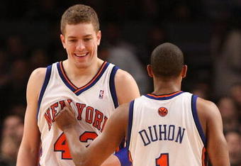 NEW YORK - MARCH 07: David Lee #42 and Chris Duhon #1 of the New York Knicks before the game against the Charlotte Bobcats on March 7, 2009 at Madison Square Garden in New York City. NOTE TO USER: User expressly acknowledges and agrees that, by downloading and or using this photograph, User is consenting to the terms and conditions of the Getty Images License Agreement.  (Photo by Nick Laham/Getty Images)
