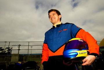 8 Feb 2002:  Carl Long, driver of the #85 Mansion Motorsports Dodge Intrepid R/T, in the garage before practice for the Daytona 500 at Daytona International Speedway in Daytona, Florida.  DIGITAL IMAGE.  Mandatory Credit: Craig Jones/Getty Images