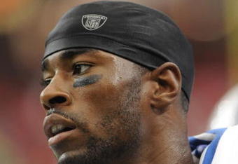 ATLANTA, GA - SEPTEMBER 7: Wide receiver Calvin Johnson #81 of the Detroit Lions watches play against the Atlanta Falcons at the Georgia Dome on September 7, 2008 in Atlanta, Georgia.  (Photo by Al Messerschmidt/Getty Images) 
