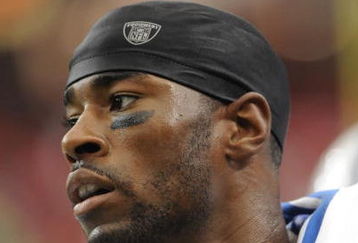 ATLANTA, GA - SEPTEMBER 7: Wide receiver Calvin Johnson #81 of the Detroit Lions watches play against the Atlanta Falcons at the Georgia Dome on September 7, 2008 in Atlanta, Georgia.  (Photo by Al Messerschmidt/Getty Images) 
