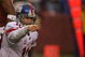 LANDOVER, MD - NOVEMBER 30: Eli Manning #10 of the New York Giants runs points to his team against the Washington Redskins during their game at FedEx Field on November 30, 2008 in Landover, Maryland. (Photo by Streeter Lecka/Getty Images)