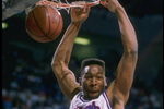 Wayman Tisdale of the Sacramento Kings slam dunks the ball during a game at the Arco Arena in Sacramento, California.