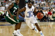DETROIT - APRIL 06: Ty Lawson #5 of the North Carolina Tar Heels drives on Travis Walton #5 of the Michigan State Spartans in the second half during the 2009 NCAA Division I Men's Basketball National Championship game at Ford Field on April 6, 2009 in Detroit, Michigan. (Photo by Streeter Lecka/Getty Images)