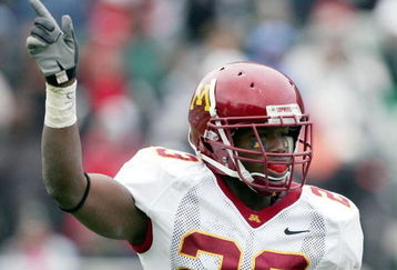 EAST LANSING, MI - NOVEMBER 11:  Dominique Barber #23 of the Minnesota Gophers reacts to a fourth down stop of the Michigan State Spartans during the third quarter at Spartan Stadium on November 11, 2006 in East Lansing, Michigan. Minnesota won 31-18.  (Photo by Harry How/Getty Images)