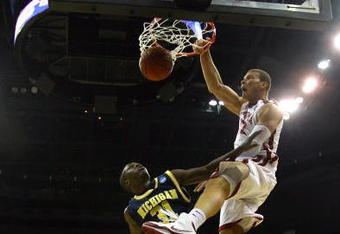KANSAS CITY, MO - MARCH 21:  Blake Griffin #23 of the Oklahoma Sooners follows through on his slam dunk over Laval Lucas-Perry #31 of the Michigan Wolverines in the first half during the second round of the NCAA Division I Men's Basketball Tournament at the Sprint Center on March 21, 2009 in Kansas City, Missouri.  (Photo by Jamie Squire/Getty Images)
