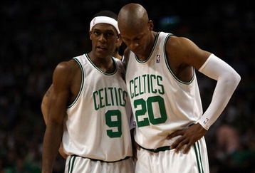 BOSTON - MAY 17:  Rajon Rondo #9 and Ray Allen #20 of the Boston Celtics talk as the Orlando Magic shoot a free throw in Game Seven of the Eastern Conference Semifinals during the 2009 NBA Playoffs at TD Banknorth Garden on May 17, 2009 in Boston, Massachusetts. The Orlando Magic defeated the Boston Celtics 101-82 to advance to the Eastern Conference Finals. NOTE TO USER: User expressly acknowledges and agrees that, by downloading and or using this photograph, User is consenting to the terms and conditions of the Getty Images License Agreement.  (Photo by Elsa/Getty Images)