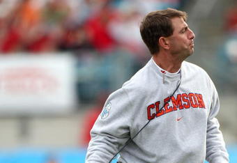JACKSONVILLE, FL - JANUARY 1:  Head coach Dabo Swinney of the Clemson Tigers throws his headset during the Konica Minolta Gator Bowl against the Nebraska Cornhuskers at Jacksonville Municipal Stadium January 1, 2009 in Jacksonville, Florida.  (Photo by Sam Greenwood/Getty Images)