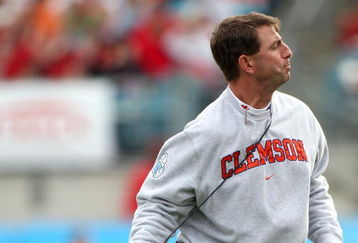 JACKSONVILLE, FL - JANUARY 1:  Head coach Dabo Swinney of the Clemson Tigers throws his headset during the Konica Minolta Gator Bowl against the Nebraska Cornhuskers at Jacksonville Municipal Stadium January 1, 2009 in Jacksonville, Florida.  (Photo by Sam Greenwood/Getty Images)