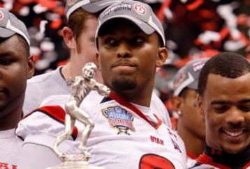 NEW ORLEANS - JANUARY 02:  (L-R) Quarterback Brian Johnson #3 and wide receiver Brent Casteel #5 of the Utah Utes celebrate after defeating the Alabama Crimson Tide 31-17 during the 75th Allstate Sugar Bowl at the Louisiana Superdome on January 2, 2009 in New Orleans, Louisiana.  (Photo by Chris Graythen/Getty Images)