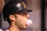 ST. PETERSBURG, FL - APRIL 30: Infielder Dustin Pedroia #15 of the  Boston Red Sox blows a bubble while waiting to bat against the Tampa Bay Rays April 30, 2009 at Tropicana Field in St. Petersburg, Florida.  (Photo by Al Messerschmidt/Getty Images)