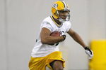 GREEN BAY, WI - MAY 1:  Wide receiver JaRon Harris #81 runs with the football as he participates in practice drills during Green Bay Packers Minicamp at Don Hutson Center on May 1, 2009 in Green Bay, Wisconsin. (Photo by Scott Boehm/Getty Images)