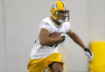 GREEN BAY, WI - MAY 1:  Wide receiver JaRon Harris #81 runs with the football as he participates in practice drills during Green Bay Packers Minicamp at Don Hutson Center on May 1, 2009 in Green Bay, Wisconsin. (Photo by Scott Boehm/Getty Images)