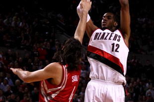 PORTLAND, OR - APRIL 28:  LaMarcus Aldridge #12 of the Portland Trail Blazers shoots against Luis Scola #4 of the Houston Rockets during Game 5 of the Western Conference Quarterfinals of the NBA Playoffs on April 28, 2009 at the Rose Garden in Portland, Oregon. NOTE TO USER: User expressly acknowledges and agrees that, by downloading and or using this Photograph, user is consenting to the terms and conditions of the Getty Images License Agreement.  (Photo by Jonathan Ferrey/Getty Images)