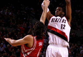 PORTLAND, OR - APRIL 28:  LaMarcus Aldridge #12 of the Portland Trail Blazers shoots against Luis Scola #4 of the Houston Rockets during Game 5 of the Western Conference Quarterfinals of the NBA Playoffs on April 28, 2009 at the Rose Garden in Portland, Oregon. NOTE TO USER: User expressly acknowledges and agrees that, by downloading and or using this Photograph, user is consenting to the terms and conditions of the Getty Images License Agreement.  (Photo by Jonathan Ferrey/Getty Images)
