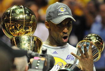 ORLANDO, FL - JUNE 14:  Kobe Bryant #24 of the Los Angeles Lakers holds the Bill Russell MVP trophy and the Larry O'Brien trophy after defeating the Orlando Magic in Game Five of the 2009 NBA Finals on June 14, 2009 at Amway Arena in Orlando, Florida. The Lakers won 99-86.  NOTE TO USER:  User expressly acknowledges and agrees that, by downloading and or using this photograph, User is consenting to the terms and conditions of the Getty Images License Agreement. (Photo by Ronald Martinez/Getty Images) 