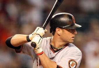 PHOENIX - JUNE 11:  Kevin Frandsen #19 of the San Francisco Giants at bat during the major league baseball game against the Arizona Diamondbacks at Chase Field on June 11, 2009 in Phoenix, Arizona.  The Diamondbacks defeated the Giants 2-1.  (Photo by Christian Petersen/Getty Images)