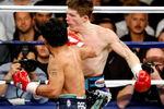 LAS VEGAS - MAY 02:  Manny Pacquiao of the Philippines hits Ricky Hatton of England during the first round of their junior welterweight title fight at the MGM Grand Garden Arena May 2, 2009 in Las Vegas, Nevada. Pacquiao defeated Hatton by a second round TKO.  (Photo by Ethan Miller/Getty Images)