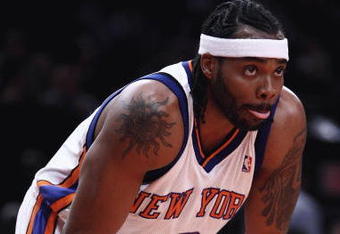 NEW YORK - FEBRUARY 25: Chris Wilcox #9  of the New York Knicks looks on against the Orlando Magic at Madison Square Garden February 25, 2009 in New York City. NOTE TO USER: User expressly acknowledges and agrees that, by downloading and/or using this Photograph, User is consenting to the terms and conditions of the Getty Images License Agreement.  (Photo by Chris McGrath/Getty Images)