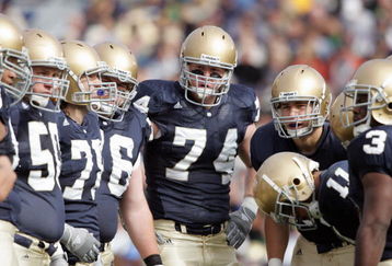 SOUTH BEND, IN - OCTOBER 21: Sam Young #74 of Notre Dame Fighting Irish stands in the huddle during the game against UCLA Bruins at Notre Dame Stadium on October 21, 2006 in South Bend, Indiana. Notre Dame won 20-17. (Photo by Andy Lyons/Getty Images)