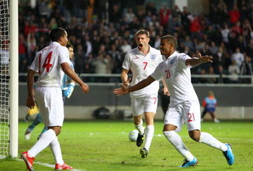 GOTHENBURG, SWEDEN - JUNE 18:  James Milner of England celebrates after scoring the second goal with Frazier Campbell and Theo Walcott during the UEFA U21 European Championships match between England and Spain at the Gamia Ullevi on June 18, 2009 in Gothenburg, Sweden.  (Photo by Phil Cole/Getty Images)
