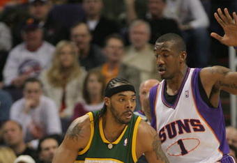 PHOENIX - FEBRUARY 8:  Chris Wilcox #54 of the Seattle SuperSonics posts against Amare' Stoudemire #1 of the Phoenix Suns on February 8, 2008 at US Airways Center in Phoenix, Arizona. NOTE TO USER: User expressly acknowledges and agrees that, by downloading and or using this Photograph, user is consenting to the terms and conditions of the Getty Images License Agreement.(Photo by Domenic Centofanti/Getty Images)