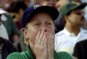 17 Jun 1999:  A distraught South Africa fan after defeat by Australia in the World Cup semi-final at Edgbaston in Birmingham, England. The match finished a tie as Australia went through after finishing higher in the Super Six table. \ Mandatory Credit: Craig Prentis /Allsport