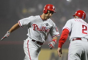NEW YORK - JUNE 11: Raul Ibanez #29 of the Philadelphia Phillies celebrates his 3 run home run in the tenth inning with third base coach Sandy Alomar #2 against the New York Mets on June 11, 2009 at Citi Field in the Flushing neighborhood of the Queens borough of New York City. (Photo by Nick Laham/Getty Images)