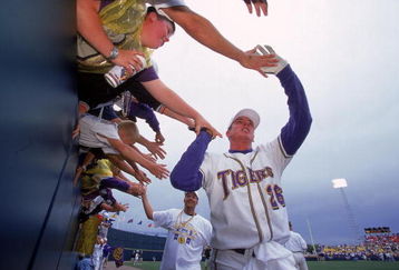 17 Jun 2000: Brad Hawde #26 of the LSU Tiger slaps hands with the band after the Championship Game of the College World Series against the Stanford Cardinals at the Resenblatt Stadium in Omaha, Nebraska. The Tigers defeated the Cardinals 6-5.Mandatory Credit: Andy Lyons  /Allsport