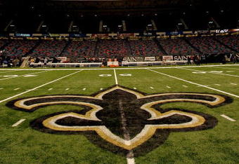 NEW ORLEANS - SEPTEMBER 25:  An interior view of the field showing the New Orleans Saints logo, a fleur-de-lis, in the newly refurbished Superdome prior to the Monday Night Football game between the Atlanta Falcons and the New Orleans Saints on September 25, 2006 at the Superdome in New Orleans, Louisiana.  Tonight's game marks the first time since Hurricane Katrina struck last August, that the Superdome, which served as a temporary shelter to thousands of stranded victims in the wake of Katrina, has played host to an NFL game.  (Photo by Ronald Martinez/Getty Images)