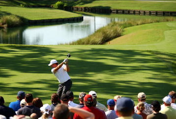 PONTE VEDRA BEACH, FL - MAY 08:  Phil Mickelson plays his tee shot on the 16th hole while a gallery of fans looks on during the second round of THE PLAYERS Championship on THE PLAYERS Stadium Course at TPC Sawgrass on May 8, 2009 in Ponte Vedra Beach, Florida.  (Photo by Richard Heathcote/Getty Images)