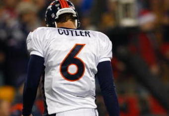 FOXBORO, MA - OCTOBER 20: Jay Cutler #6 of the Denver Broncos walks off the field against the New England Patriots at Gillette Stadium on October 20, 2008 in Foxboro, Massachusetts. (Photo by Jim Rogash/Getty Images)