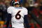 FOXBORO, MA - OCTOBER 20: Jay Cutler #6 of the Denver Broncos walks off the field against the New England Patriots at Gillette Stadium on October 20, 2008 in Foxboro, Massachusetts. (Photo by Jim Rogash/Getty Images)