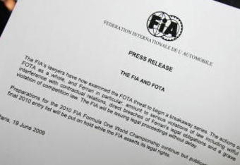 NORTHAMPTON, UNITED KINGDOM - JUNE 19:  In this photo illustration the F.I.A. press release concerning current dispute is held during practice for the British Formula One Grand Prix at Silverstone on June 19, 2009 in Northampton, England.  (Photo Illustration by Ker Robertson/Getty Images)