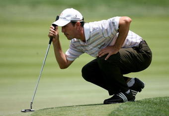 DUBLIN, OH - JUNE 06:  Mike Weir of Canada lines up a putt on the fourth hole during the third round of the Memorial Tournament on June 6, 2009 at the Muirfield Village Golf Club in Dublin, Ohio.  (Photo by Andy Lyons/Getty Images)