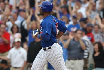 CHICAGO - JUNE 18: Derrek Lee #25 of the Chicago Cubs runs the bases after hitting a three-run home run in the 8th inning against the Chicago White Sox on June 18, 2009 at Wrigley Field in Chicago, Illinois. The Cubs defeated the White Sox 6-5. (Photo by Jonathan Daniel/Getty Images)