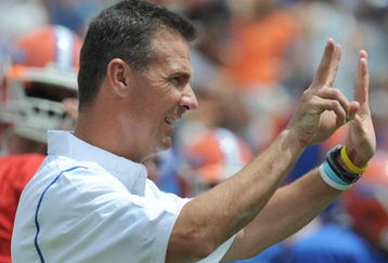 GAINESVILLE, FL - APRIL 18: Coach Urban Meyer of the University of Florida directs the spring football Orange and Blue game April 18, 2009 at Ben Hill Griffin Stadium in Gainesville, Florida.  (Photo by Al Messerschmidt/Getty Images)