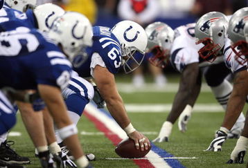 INDIANAPOLIS - NOVEMBER 04:  Offensive center Jeff Saturday #63 of the Indianapolis Colts readies the ball for the snap against the New England Patriots on November 4, 2007 at the RCA Dome in Indianapolis, Indiana. The Patriots won 24-20.  (Photo by Andy Lyons/Getty Images)