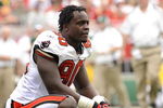 TAMPA, FL - SEPTEMBER 28: Defensive end Gaines Adams #90 of the Tampa Bay Buccaneers pauses during play against the Green Bay Packers at Raymond James Stadium on September 28, 2008 in Tampa, Florida.  (Photo by Al Messerschmidt/Getty Images) 