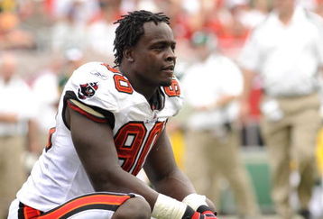 TAMPA, FL - SEPTEMBER 28: Defensive end Gaines Adams #90 of the Tampa Bay Buccaneers pauses during play against the Green Bay Packers at Raymond James Stadium on September 28, 2008 in Tampa, Florida.  (Photo by Al Messerschmidt/Getty Images) 