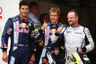 NORTHAMPTON, UNITED KINGDOM - JUNE 20: Pole sitter Sebastian Vettel (C) of Germany and Red Bull Racing celebrates with second placed Rubens Barrichello (R) of Brazil and Brawn GP and third placed Mark Webber (L) of Australia and Red Bull Racing following qualifying for the British Formula One Grand Prix at Silverstone on June 20, 2009 in Northampton, England. (Photo by Paul Gilham/Getty Images)