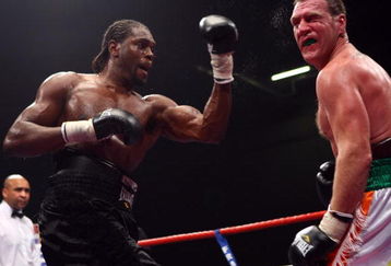 LONDON - DECEMBER 06:  Audley Harrison connects with a left uppercut during his  heavyweight fight against Martin Rogan on December 6, 2008 at ExCel Arena in London.  (Photo by John Gichigi/Getty Images)