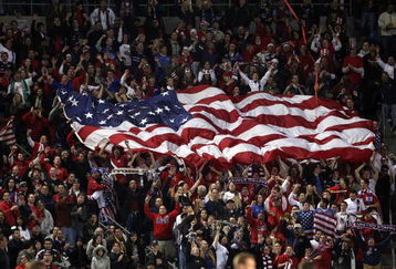 CARSON, CA - JANUARY 19:  Fans of the U.S. Men's National Team unfurl a flag of the USA in the stands during the international friendly against Sweden on January 19, 2008 at the Home Depot Center in Carson, California. USA defeated Sweden 2-0. (Photo by Stephen Dunn/Getty Images)