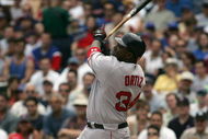 CHICAGO - JUNE 10:  Designated hitter David Ortiz #34 of the Boston Red Sox swings at a Chicago Cubs pitch during the game on June 10, 2005 at Wrigley Field in Chicago, Illinois. The Cubs defeated the Red Sox 14-6. (Photo by Jonathan Daniel/Getty Images)