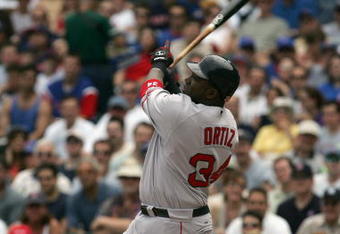 CHICAGO - JUNE 10:  Designated hitter David Ortiz #34 of the Boston Red Sox swings at a Chicago Cubs pitch during the game on June 10, 2005 at Wrigley Field in Chicago, Illinois. The Cubs defeated the Red Sox 14-6. (Photo by Jonathan Daniel/Getty Images)
